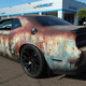 Image for article titled This Rust-Wrapped Dodge Challenger SRT Hellcat Is Making Me Have a True Existential Debate